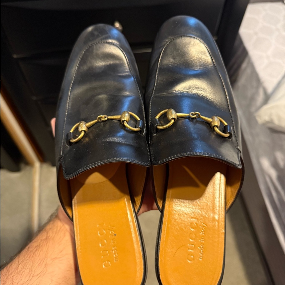 Gucci Black Leather Mules with Gold Accents